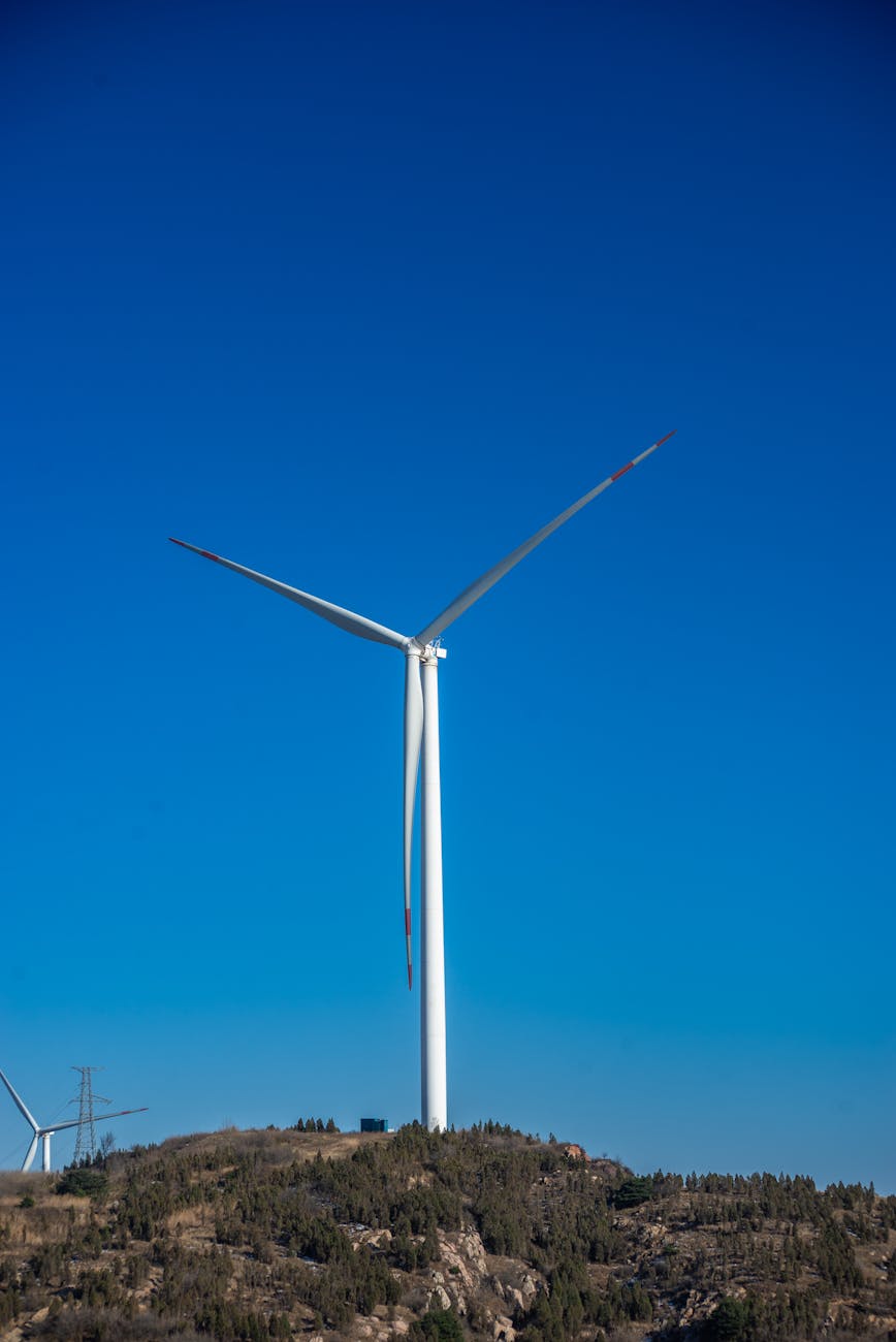 modern wind turbine against clear blue sky